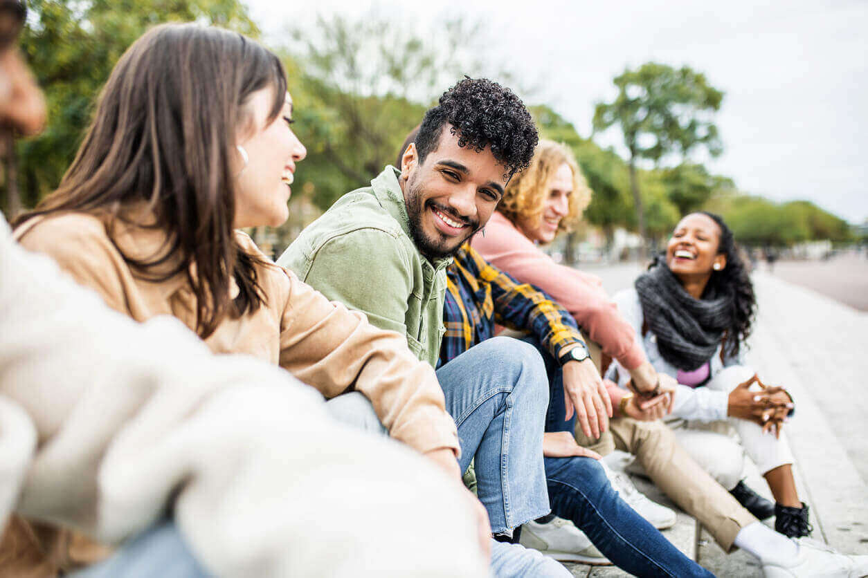 Diverse group of young people laughing and having fun together