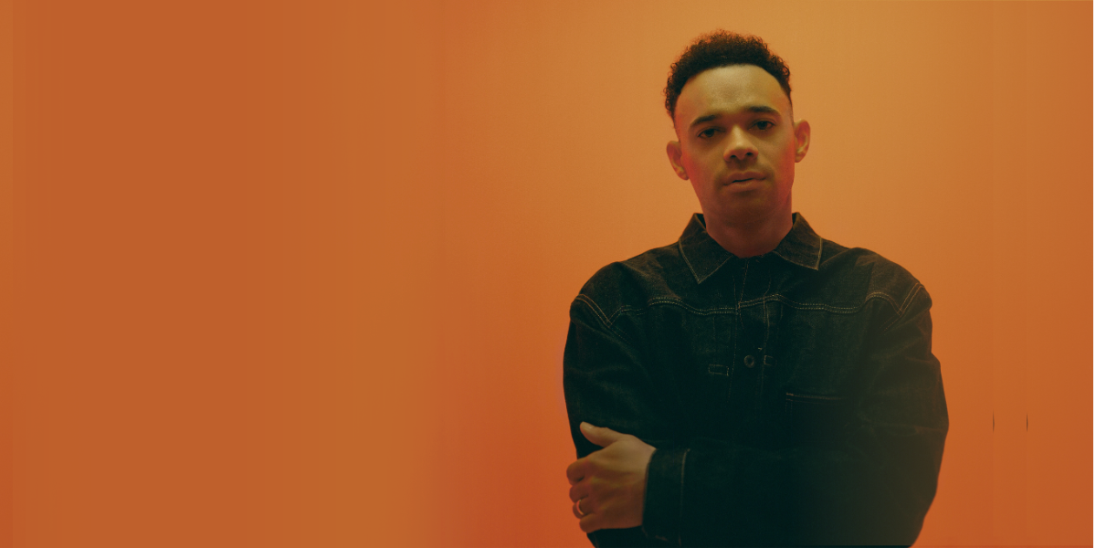 Tauren Wells on an orange background